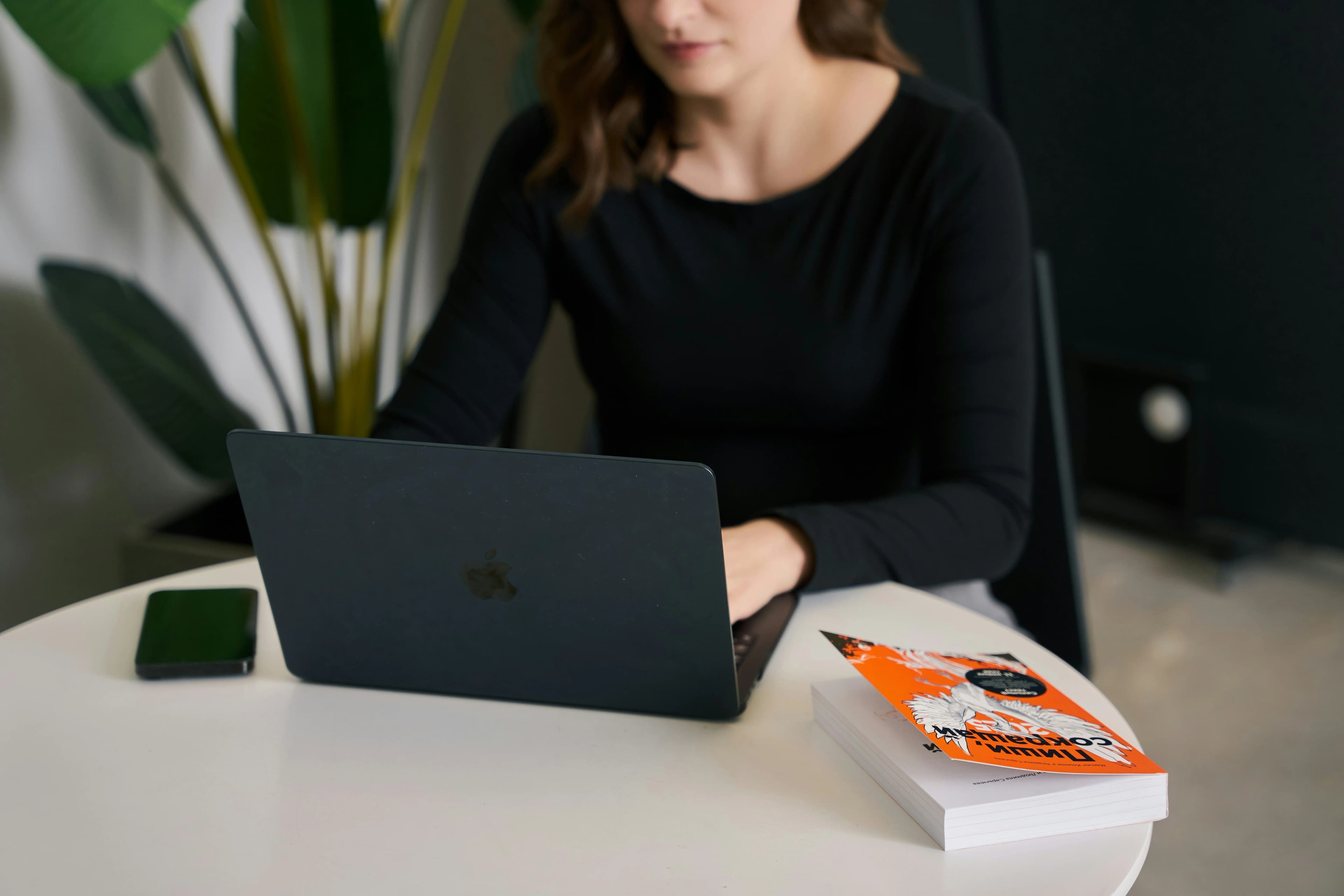 Businesswoman analyzing customer data on digital tablet